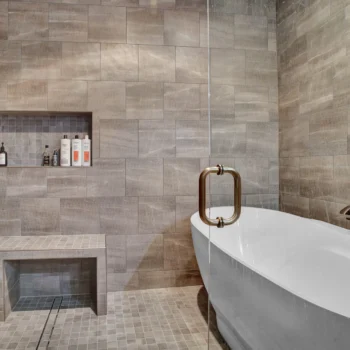 Drop-Tine Ranch bathroom wet room with shower and tub